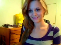 Eye catching zealous auburn webcam babe plays with her tight boobies