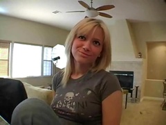 Cute girl in jeans sings for the camera