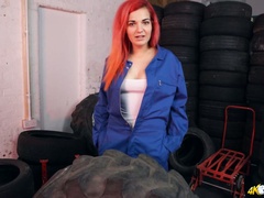 Red haired babe Dolly shows off her ripe and juicy boobies