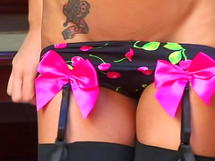 Girl in stockings shows us her tits