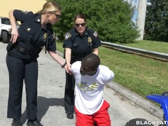 Sex-hungry police women fuck one arrested BBC and make him lick pussies