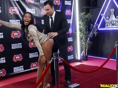 Sexy ass ebony spins the big white cock on the red carpet