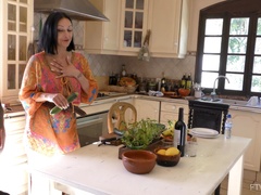 Busty brunette MILF Cassie pleasures her cunt with a cucumber