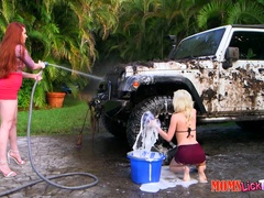 Irresistible beauty Veronica Vain fucks her Gf on the car hood outdoors