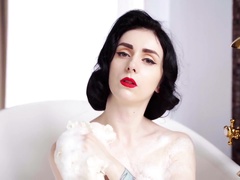 Sexy Brunette Takes A Bubble Bath
