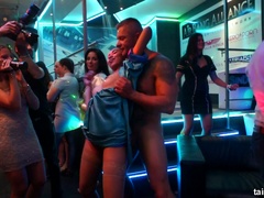 Slutty ebony chick in the club sucks white dick for facial cumshot