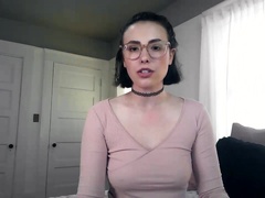 Giggling nerdy brunette whore Casey Calvert flashes her boobs and goes solo