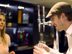 A horny babe does a blow job to a guy on the red sofa