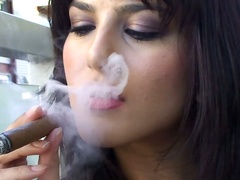 Raven haired webcam babe with big tits smokes a cigar before steamy sex