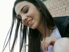 Kinky young brunette is riding her lover's aggregate outdoors