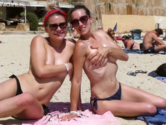 Bikini hottie Manii C is ready for topless photo session on the beach