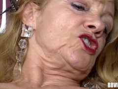 Mature German amateur with big tits joins a kinky couple for a blazing threesome