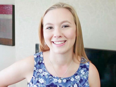 Smiling babe with a large ass is handling a cock