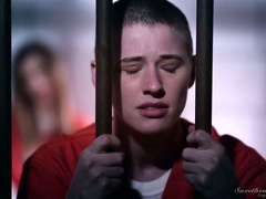 Two skinny white female convicts in the jail cell pleasure each other