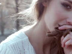 Auburn haired slender white young chick with big breasts plays with her pussy