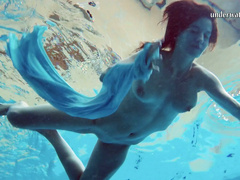 Big tittied swimming bitch Piyavka Chehova shows striptease under the water